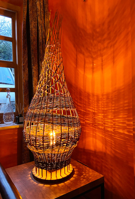 Aboriginal Style Lamp - illuminated - woven with a mix of willow, cane & copper coloured wire - 41” x 18”